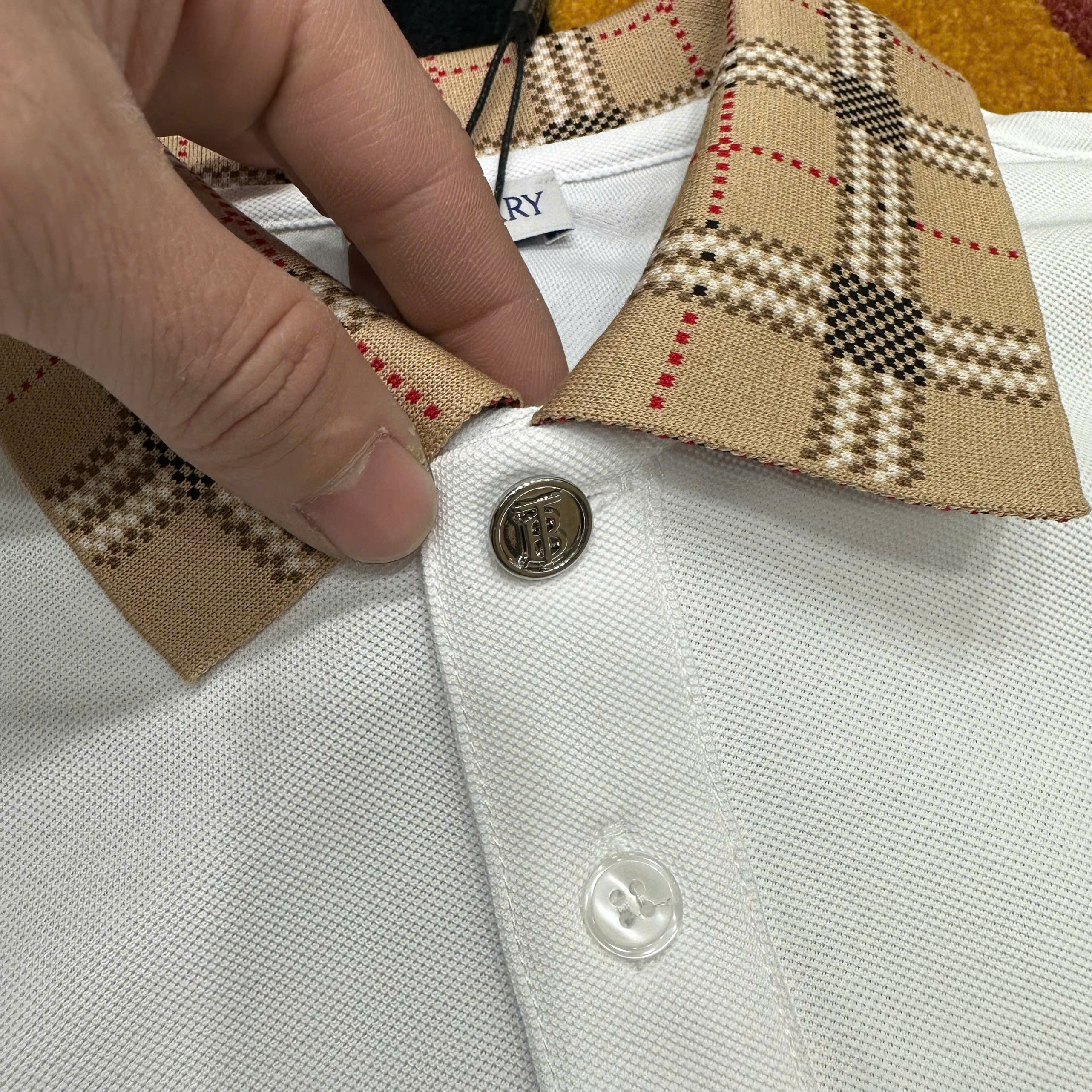 Áo polo Burberry logo thêu ngực phối kẻ sọc cổ tay Nâu Like Auth 1-1 on web MK